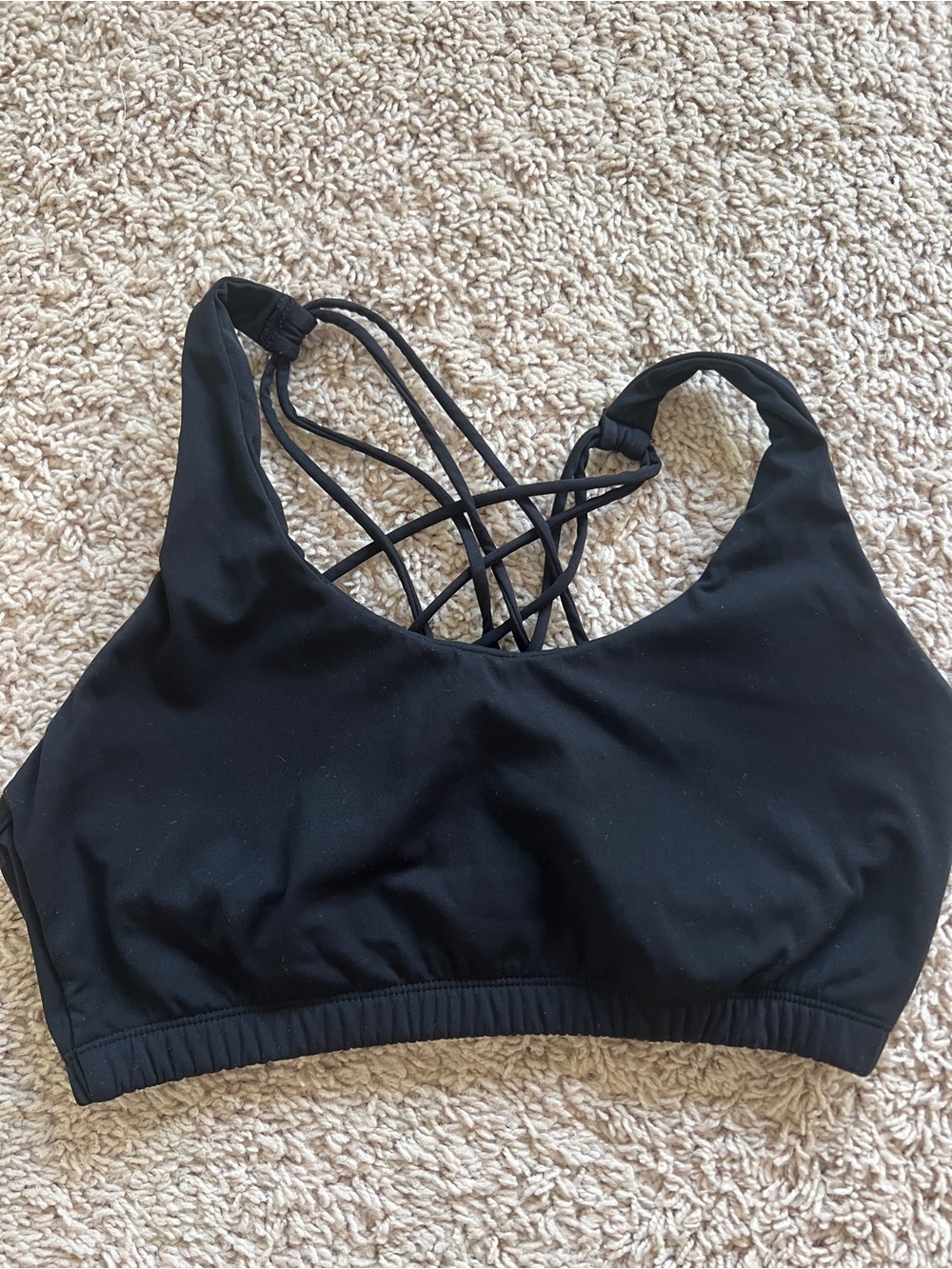 Black strappy sports bra with padding